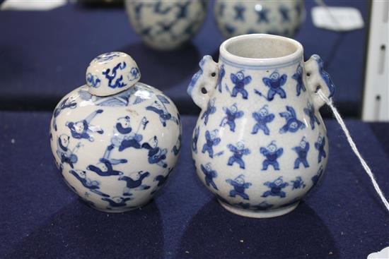 Two Chinese blue and white hundred boys vases, larger 8cm.